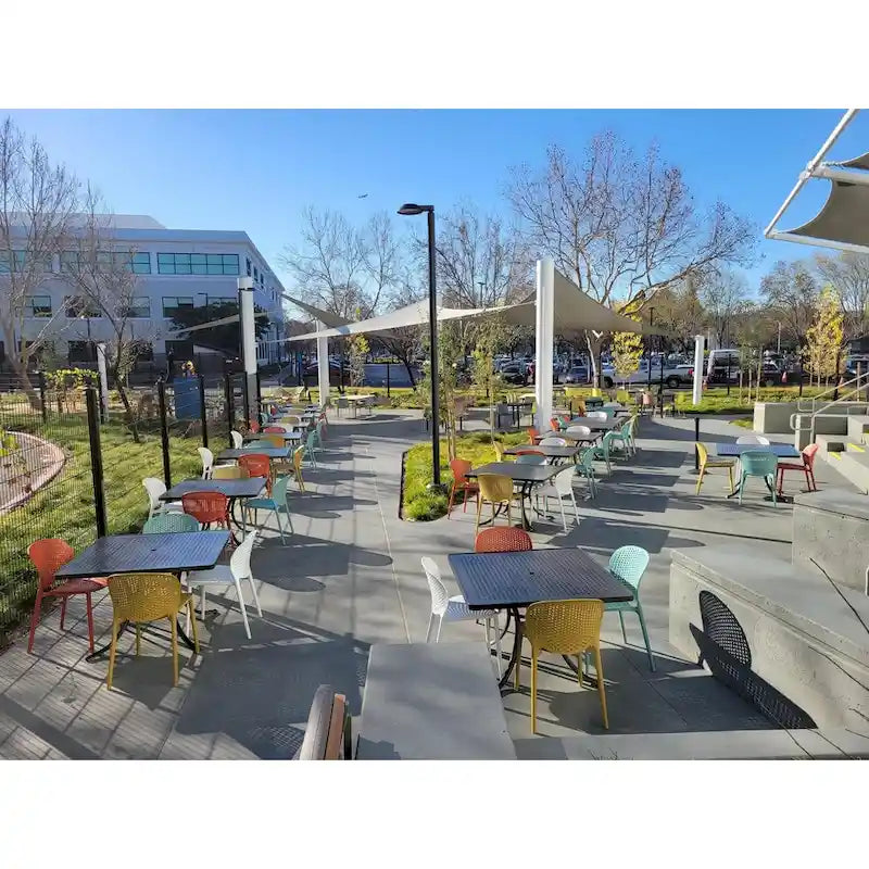 Modern Plastic Garden Patio Indoor or Outdoor Dining Stackable Chair UV Protected Armless With Dot Back Surf